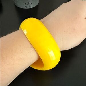yellow resin bangle bracelet.